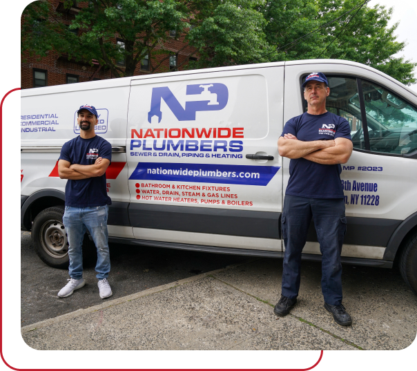Two Nationwide Plumbers technicians standing with company merch in front of company van