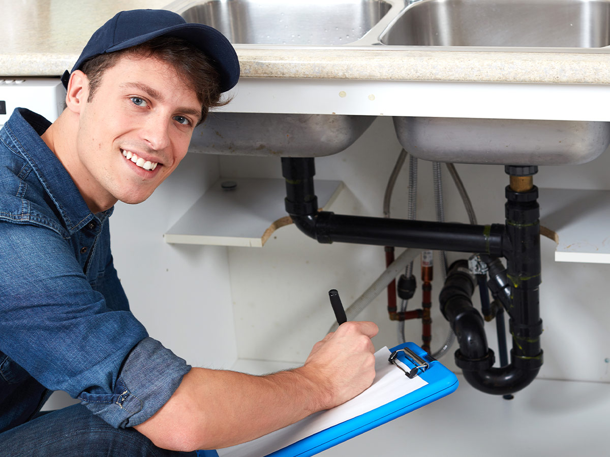 a licensed plumber with a clipboard